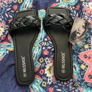 NWT black slip ons size 8